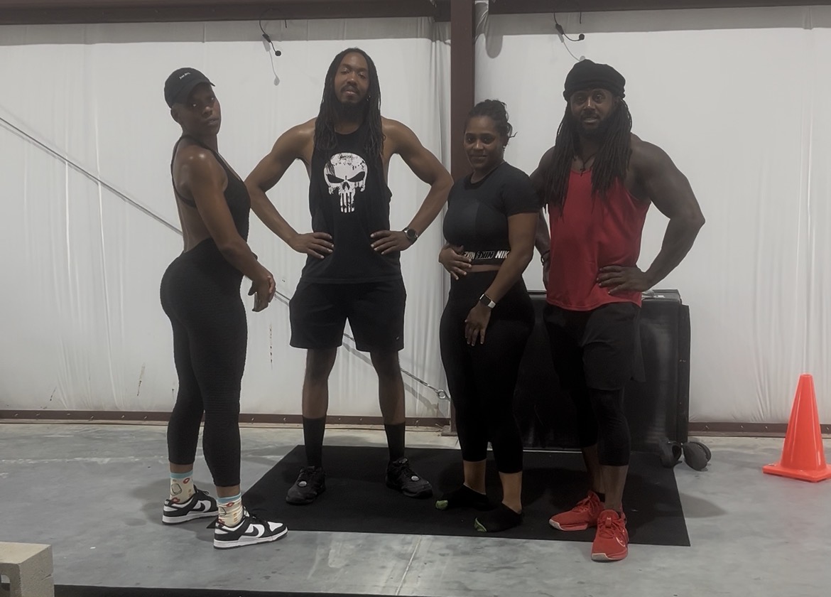 The Legends Xclusive coaching team inside the Humble, TX training facility